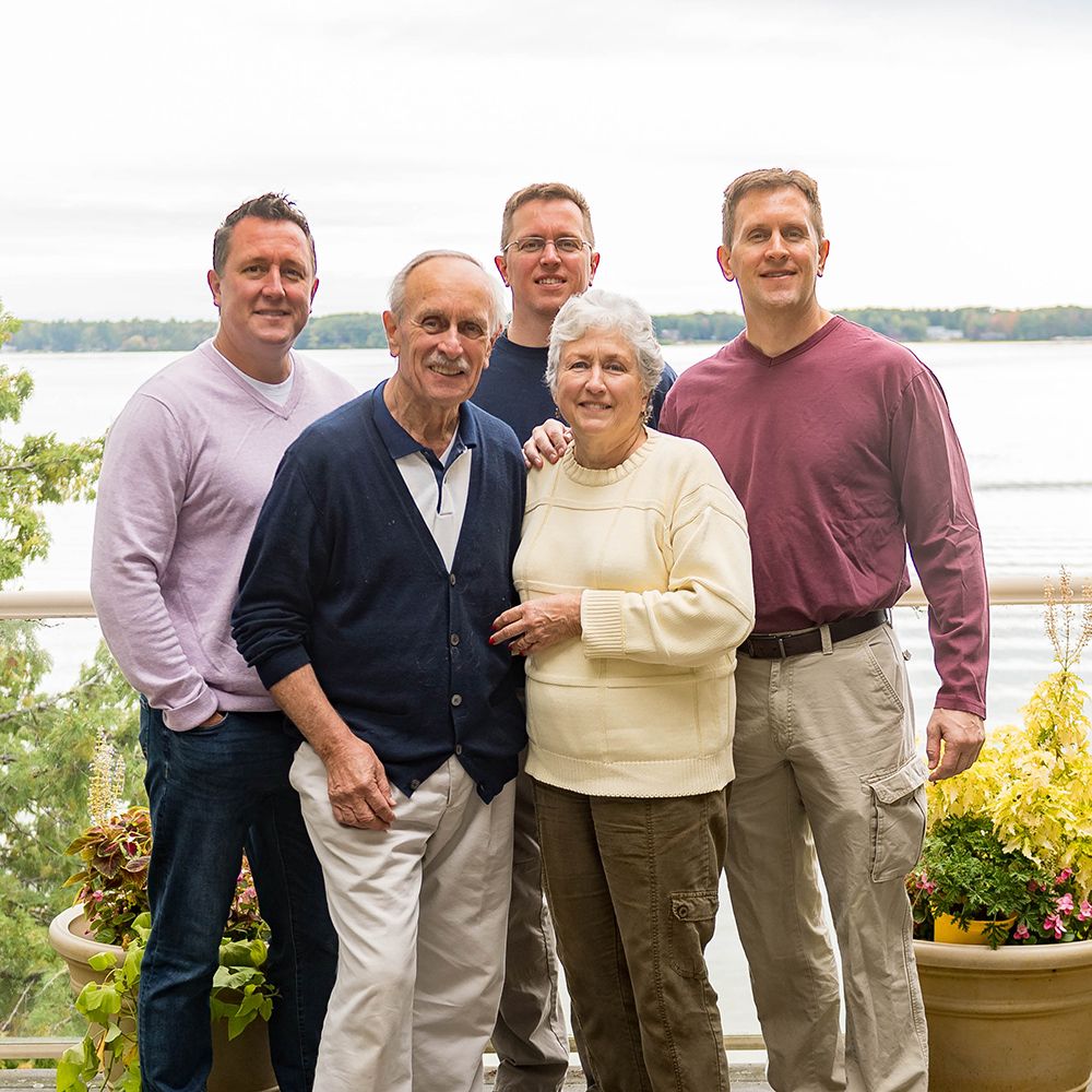 Family of older couple and adult children